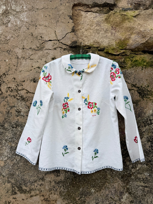 Espiga dourada, cravo azul