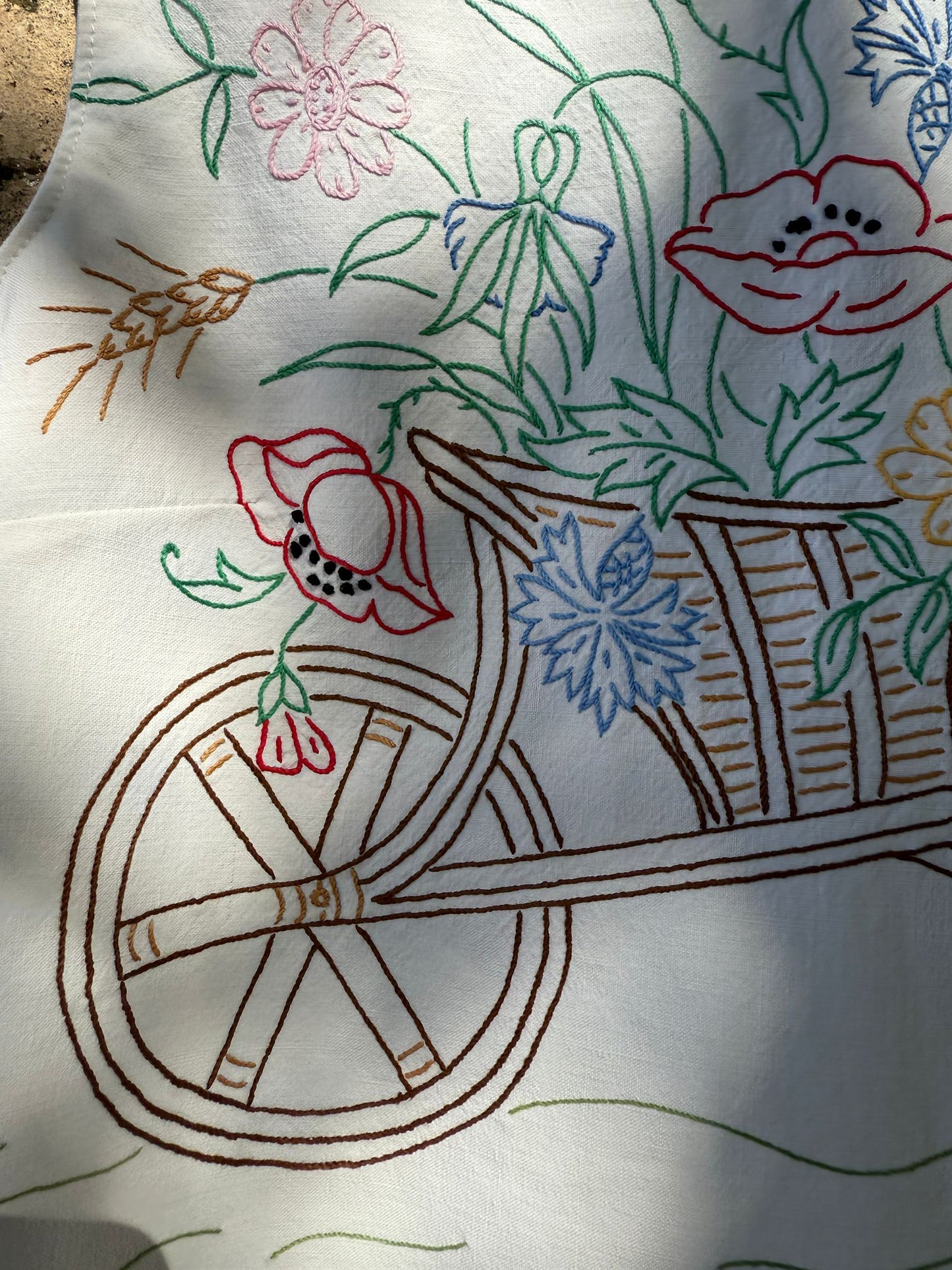 Carrego comigo flores de muitas cores