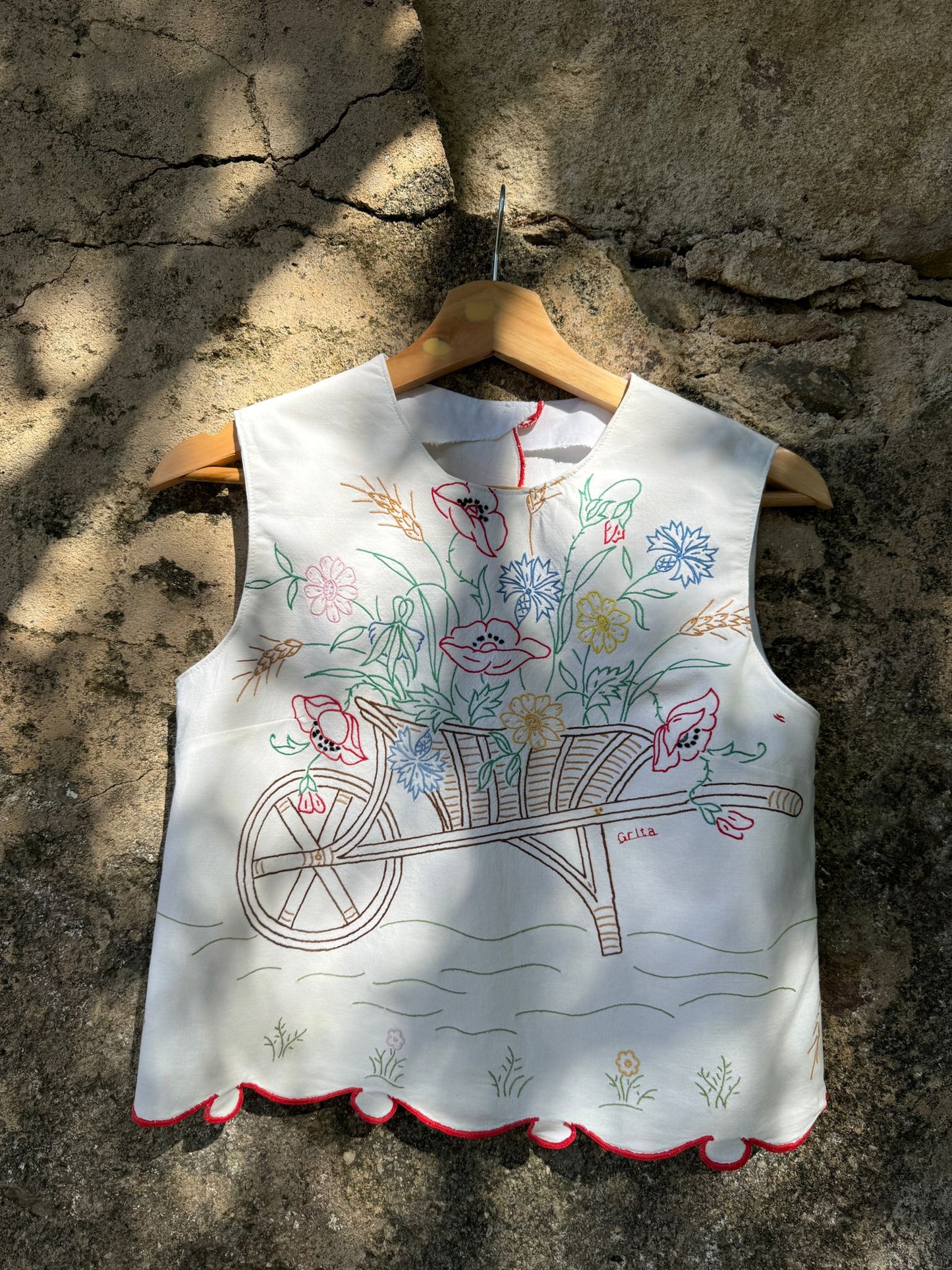 Carrego comigo flores de muitas cores